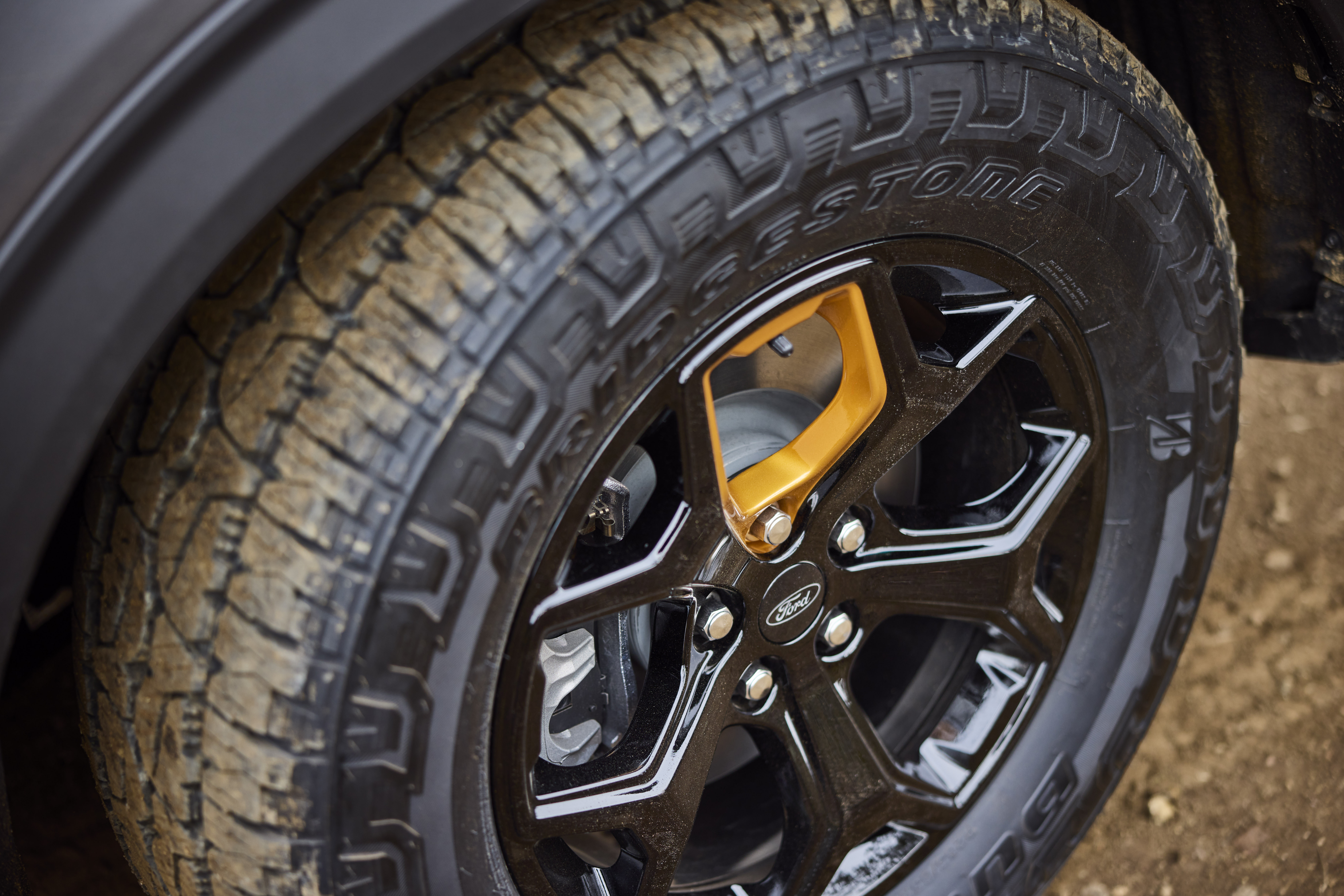 The Explorer Tremor's 18-inch wheels wrapped in all-terrain tires.